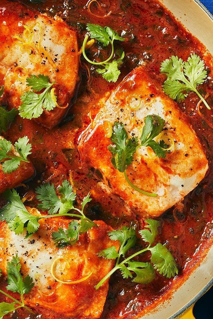 This simple braised fish dish combines a spiced tomato sauce with spinach, cod, and couscous. Get the recipe for Braised Fish With Spicy Tomato Sauce. Tomato Fish Recipe, Spicy Cod Recipes, Fish Tomato Sauce Recipe, Fish Tomato Recipe, Fish With Tomato Sauce, Fish In Tomato Sauce Recipe, Braised Fish Recipe, Fish In Tomato Sauce, Italian Fish Stew