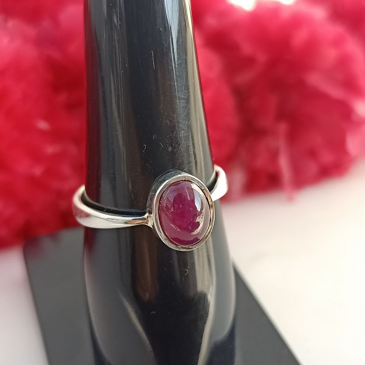 Handmade ruby bohemian ring , you can wear this ring as a party wear ring .. Title - ruby silver ring Stone color - ruby Stone shape - oval Material - Sterling silver 925 Note - We use natural gemstones, so color shade may be little bit different .. we are giving you best quality rings on best price .. contact us for more quantity Handmade Ruby Ring As Gift, Spiritual Oval Ruby Ring, Bohemian Sapphire Ring As Gift, Ruby Promise Ring With Stone Setting, Bohemian Round Ruby Gemstone Ring, Bohemian Gemstone Midi Rings For Gift, Bohemian Silver Oval Ruby Ring, Unique Handmade Oval Ruby Ring, Bohemian Sterling Silver Ruby Ring