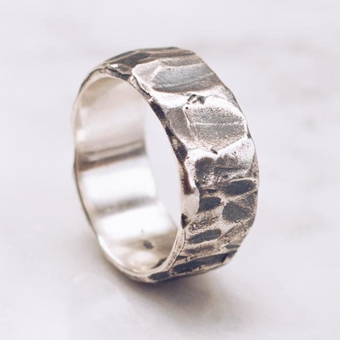 A textured Band Ring in 925 Sterling Silver with a unique raw textured and hammered finish. A stylish piece for both men and women. Available in Brass https://etsy.me/2U8LIgT Ring Size Available in all sizes. Please be sure to find your exact ring size for the finger you want before ordering. See image chart above or you can use the chart on my website as a guide - https://jewelrylab.co/pages/ring-sizing-tips Every piece is handcrafted in Bali and made with Intention, Love, and Soul so that it c Silver Snake Bracelet, Power Ring, Hammered Ring, Hammered Rings, Sterling Silver Rings Bands, Textured Ring, Mens Silver Rings, Handmade Rings, Necklace Women