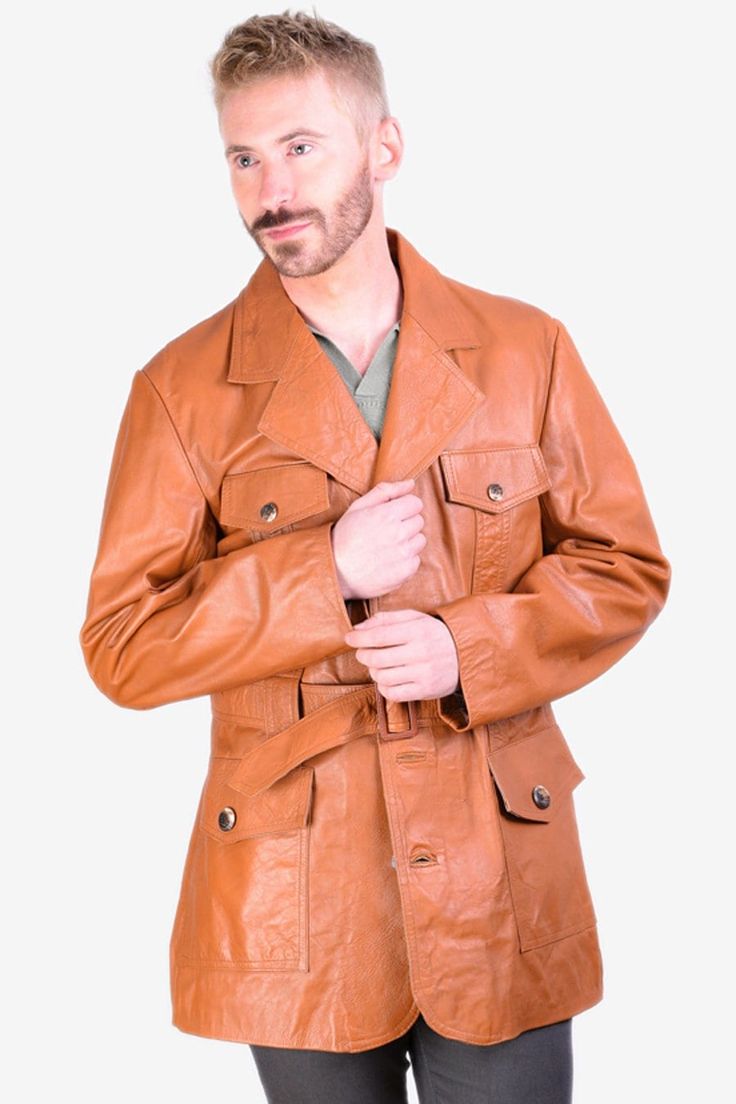 Vintage 1970's leather safari jacket in a tan brown in colour. Classic wide notched lapels from the era. Four front pockets and waist belt. Mid vent reverse. Made from genuine leather and fully inside lined. Condition: Excellent vintage condition. Chest: 38in Length: 33in Inside sleeve: 19in Across the shoulders: 18in More vintage clothing on our website www.brickvintage.com Brown Leather Messenger Bag, Animal Sweater, Safari Jacket, Leather Messenger Bag, Leather Messenger, Etsy Fashion, Vintage Brown, Waist Belt, Tan Brown