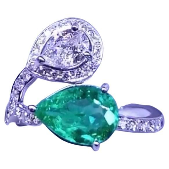 An exclusive and refined design, so elegant and chic, in 18k gold with a Colombian emerald in pear cut of 1,50 carats, excellent quality, fine grade and color , very high quality, and with a GIA certified diamond of 0,40 carats D/VS1, and around diamonds in round brilliant cut of 0,39 carats,F/VS. Handcrafted by artisan goldsmith. Excellent manufacture and quality. Complete with AIG report and GIA certificate . Whosale price. Note:on my shipment,customers not pay taxes and duty. Gia Certificate, Colombian Emeralds, Fine Jewels, Gia Certified Diamonds, Pear Cut, Round Brilliant, Pretty Things, Fashion Rings, Diamond Ring