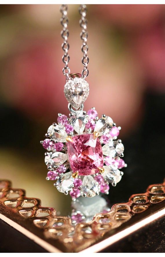 •Condition: Brand new•Center Stone: Natura Pink Spinel, Cushion Cut, approx 1.03ct, 5.7 x 5.3mm•Side Stone:Natural White Sapphire, Pear cutNatural Ruby, Marquise cutNatural White Diamond, Round Cut (VS1 clarity and F color) •Gold Weight: approx 1.7g•Pendant Dimension: 19x11mm•Metal Purity: Optional Each piece is made-to-order with care and special attention to detail. all items are made with conflict-free diamonds and gems.The item will be gift wrapped and shipped.------------------------------- Luxury Platinum Jewelry With Cluster Design, Luxury Platinum Cluster Jewelry, Elegant Gia Certified Pink Sapphire Jewelry, Gia Certified White Gold Pink Sapphire Jewelry, Pink Platinum Jewelry With Brilliant Cut, Pink Brilliant Cut Platinum Jewelry, Luxury Jewelry With Brilliant Cut Cluster, Luxury Cluster Jewelry With Brilliant Cut, Luxury Brilliant Cut Cluster Jewelry