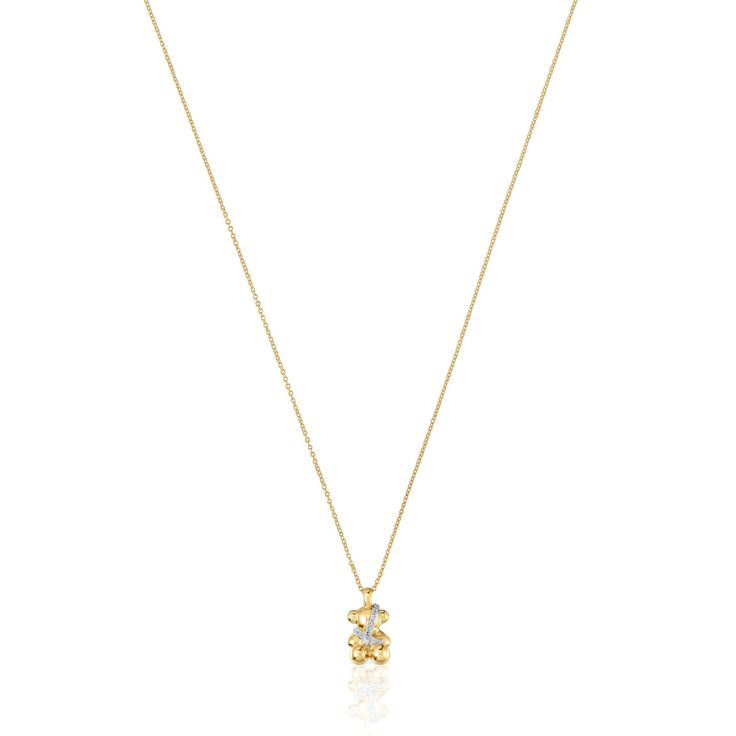 Discover the new Lligat collection, which comes from the idea of tying materials together to achieve a new bulky shape. Get the short bear necklace in 18kt gold and diamonds, and give your look a touch of class. Short TOUS Lligat necklace with 18kt yellow gold bear motif and 0.08ct diamonds. Size of bear: 19x7.1 mm. Diamond quality: H/SI. Necklace length: 45 cm. Spring ring clasp. The Lligat collection in gold and diamonds guarantees full traceability of all its materials, as well as their manuf Bear Necklace, Yellow Gold Pendants, Gold Pendant Necklace, Spring Rings, Lalique, Gold Pendant, Necklace Lengths, Yellow Gold, Vogue