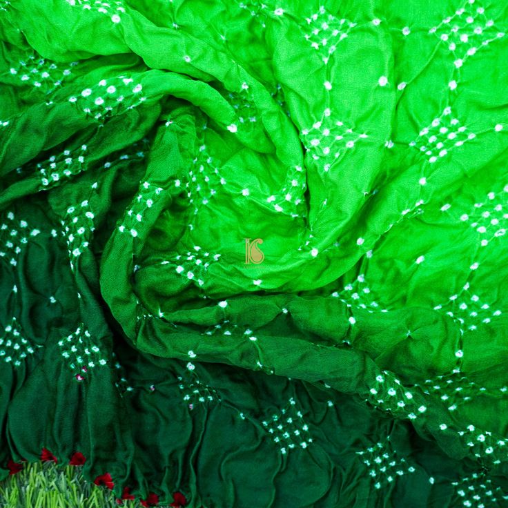 Category: Blouse Fabric Fabric: Gajji Silk Weave – Bandhani Color –Green Length – 1 meter Note- There may be slight color variations due to photographic reasons. This is a hand-woven product and any irregularities in the weaving or pattern should not be taken as a defect. These irregularities make every handloom piece unique. Green Bohemian Traditional Wear With Bandhani Print, Semi-stitched Bohemian Blouse Piece With Bandhani Print, Bohemian Green Traditional Wear With Bandhani Print, Bohemian Semi-stitched Blouse Piece With Bandhani Print, Bohemian Bandhani Blouse Piece For Festivals, Bohemian Bandhani Print Blouse For Diwali, Bohemian Blouse With Bandhani Print For Festivals, Bohemian Bandhani Print Saree For Festival, Green Bohemian Art Silk Traditional Wear