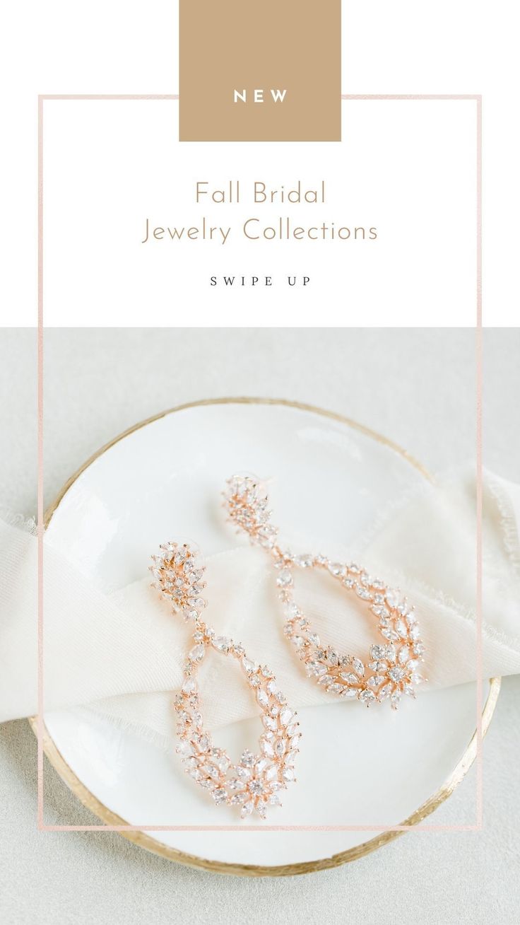 Just in time for fall weddings, the Angelina crystal wedding drop earrings are the perfect timeless accessory for the bride on her special day. Find more beautiful wedding jewelry at Wink of Pink Shop! #forthebride #weddingaccessory #weddingearrings #dropbridalearrings #weddingjewelry #bridallook #bridaltheme #bridalstyle #fallwedding Glamorous Wedding Diamond Earrings With Accents, Glamorous Wedding Diamond Earrings With Diamond Accents, Glamorous Diamond Earrings With Sparkling Stones For Wedding, Glamorous Wedding Crystal Earrings With Diamond Accents, Glamorous Rose Gold Cubic Zirconia Chandelier Earrings, Wedding Cubic Zirconia Earrings With Diamond Accents, Glamorous Wedding Diamond Earrings With Elegant Design, Rose Gold Diamond Crystal Earrings For Wedding, Glamorous Diamond Earrings With Elegant Design For Wedding