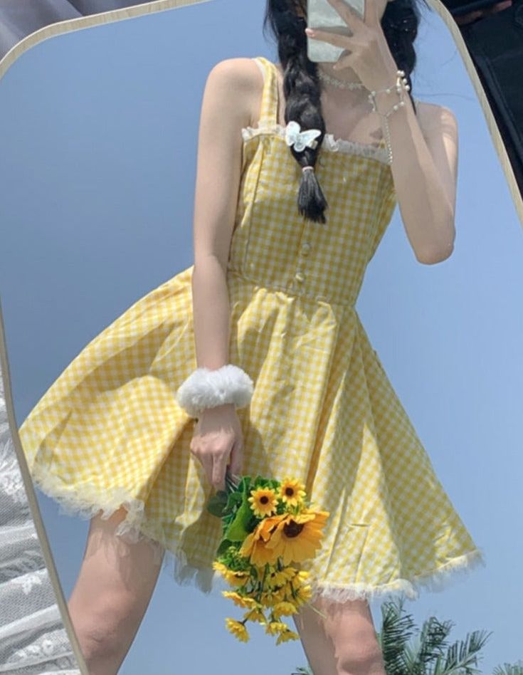 🌞 Step into Sunshine with Our Yellow Plaid Picnic Dress! 🌼👗 🌼 Cheerful and Chic: Our Yellow Plaid Picnic Dress is designed for those who appreciate the brightness of sunshine and want to radiate style effortlessly. Ideal for individuals who love to blend a touch of happiness with fashion. ✨ Superior Quality: Crafted with precision to ensure top-notch quality and style. This dress is designed to keep you looking both joyful and confident, whether you're out for a picnic or a casual outing. 💫 Cute Cotton Mini Dress For Summer, Yellow Casual Mini Dress For Picnic, Spring Gingham Fitted Sundress, Casual Yellow Mini Dress For Picnic, Fitted Gingham Sundress For Spring, Spring Sleeveless Mini Dress For Picnic, Cute Spring Mini Dress For Picnic, Cute Ruffled Sundress For Picnic, Gingham Sundress For Spring