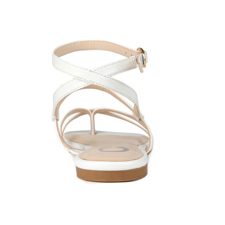 The Serissa sandals by Journee Collection are the ultimate summer go-to. This foot-framing fit features slender vegan leather crisscross straps and a dainty buckle closure. A tiny block-heel and a heavenly padded footbed finish this warm-weather companion. At Journee Collection our sandal styles are going to be perfect for any occasion. Whether that be a formal business or casual dress these sandals will be a perfect match. Versace Jewelry, Versace Handbags, Sandals Collection, Luggage Bags Travel, Versace Accessories, Sandals White, Slingback Sandals, Flip Flop Slippers, Formal Business