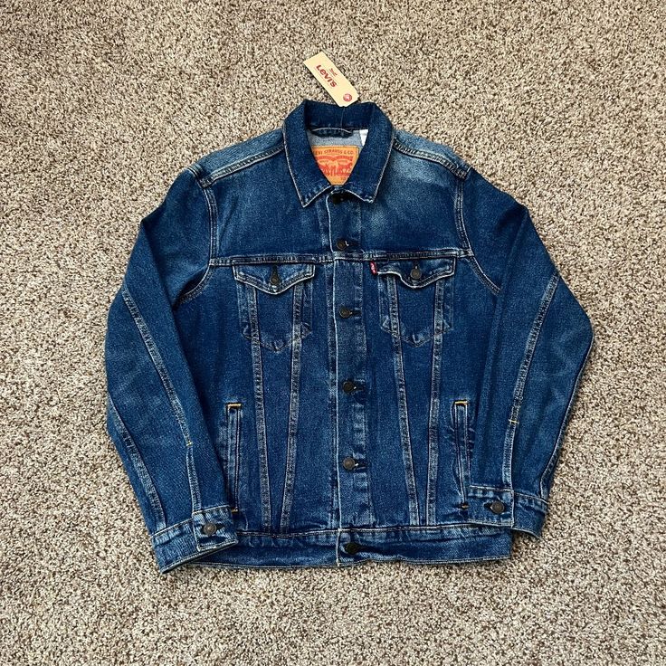 Medium Stonewash Sized Medium Men’s. Never Worn. Depicted Item Is As True Blue As The First Two Photos. 1 Interior Pocket With 4 Exterior Pockets. All Fasteners Are Button Up. Adjustable Waist Hem. Wpl 423 Ca00342 723340224 Levi's Dark Wash Denim Jacket With Button Closure, Levi's Washed Denim Jacket For Streetwear, Levi's Washed Denim Jacket, Levi's Dark Wash Denim Jacket For Fall, Levi's Medium Wash Denim Jacket For Streetwear, Levi's Washed Denim Jacket For Winter, Levi's Relaxed Fit Medium Wash Denim Jacket, Levi's Light Wash Denim Jacket With Pockets, Levi's Casual Denim Jacket In Medium Wash