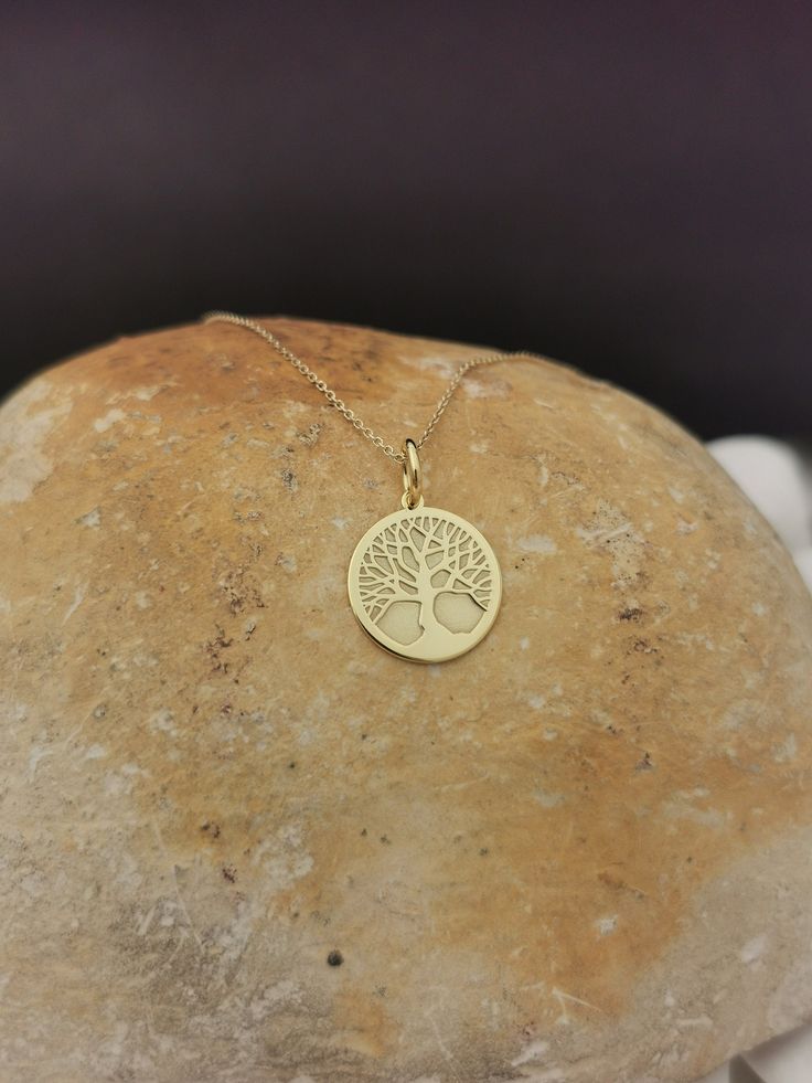 "Dainty 14k Solid Gold Tree of life Necklace, Gold Tree Necklace, Custom Tree of life necklace, Personalized Gold Tree Of Life Necklace 14k Solid Gold Choose What Size You Want the Pendant Using The Second Option Box Photos Are For The 0.5 inch Diameter Pendant Pendant thickness : 0.5mm Inner diameter of jump ring : 4mm ♥ Material of pendant and chain: Solid Gold k14 ♥ Packaging: All of our jewelry are beautifully boxed and ready for gifting For more personalized designs take a look here: ♥ www. Sterling Silver Yellow Gold Tree Of Life Necklace, Yellow Gold Sterling Silver Tree Of Life Necklace, Gold Tree Of Life, Second Option, Gold Tree, Tree Of Life Necklace, Tree Necklace, Necklace Personalized, Necklace Gold