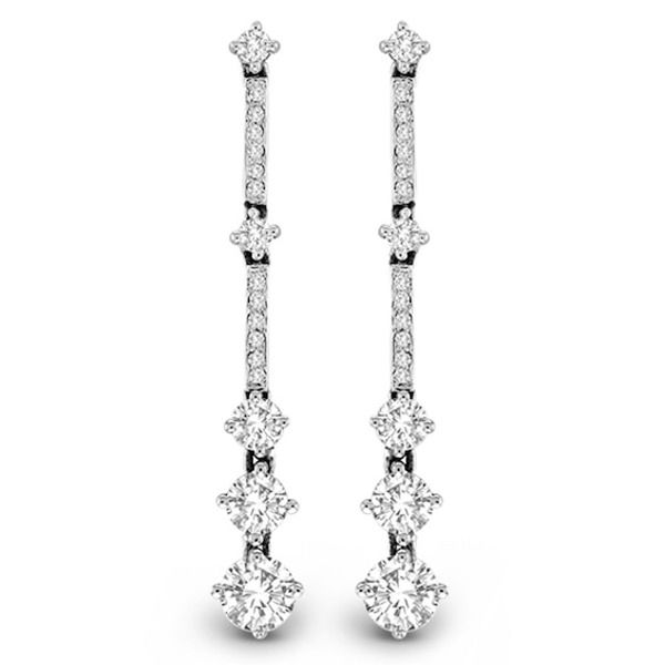 Long, lean and so elegant, these diamond drop earrings will take her breath away. Crafted in 14K white gold, each linear diamond-lined drop features larger diamond stations that catch the eye and add dimension to the designs. A fashion-forward look perfect for the special evening out, these earrings dazzle with 2 cts. t.w. of diamonds and are finished with a bright polished shine. The earrings secure comfortably with friction backs. Luxury Linear Diamond Earrings With Single Cut Diamonds, Luxury Linear Earrings With Single Cut Diamonds For Anniversary, Formal Dangle Linear Earrings With Single Cut Diamonds, Formal White Gold Linear Earrings With Single Cut Diamonds, White Diamond Linear Earrings With Prong Setting, Luxury White Diamond Linear Earrings, Diamond White Brilliant Cut Linear Earrings For Formal Events, Formal White Gold Linear Earrings With Prong Setting, Elegant White Gold Linear Earrings With Single Cut Diamonds