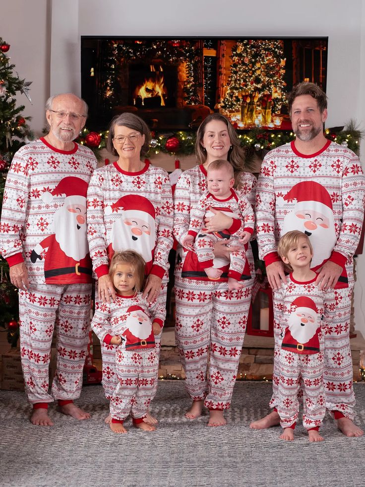 Complete your family's Christmas look with these matching pajama sets, including adult, kid, baby and pet sizes. The large Santa Claus pattern and Christmas-themed background add a festive touch to your holiday moments.
* Please add each size separately to your shopping cart.
* Piece of product: Each size includes 1 set of pajamas (1 top+1 bottom), 1 romper, or 1 pet bandana.
* For children's safety, pajamas should be snug-fitting or flame-resistant. These kids' and babies' pajamas are flame-resistant.
* Drawstring waistband and pockets for adults.
* Fabric characteristics: Soft and comfortable.
* Neckline: Round neck.
* Sleeves: Long sleeves.
* Style: Matching Christmas family pajamas.
* Fit: Moderate fit.
* Length: Moderate length.
* Source of goods: Imported.
* Supplier: PatPat. Family Christmas Onesies, Pajama Party Outfit Ideas, Pajama Party Outfit, Christmas Pajamas Family, Christmas Pajama Party, Matching Family Christmas Pajamas, Cute Christmas Outfits, Family Pajama Sets, Couple Pajamas