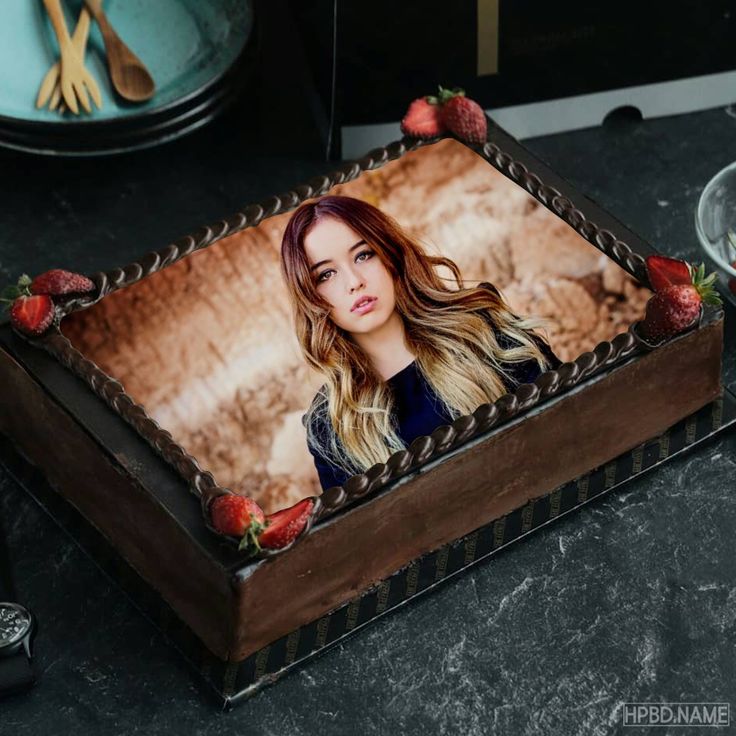 a cake with a photo of a woman on it