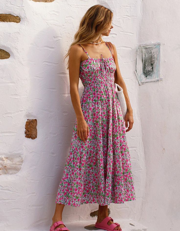 Block-printed by hand in the much-loved Lolita print, the Seychelles dress is a summer favorite you won’t want to take off. We love the pop of neon pink set against the zesty green in this vibrant print. Finished with adjustable spaghetti straps, a full, tiered skirt and rows of elastic under the bust, the Seychelles dress is an effortless and flattering piece you’ll wear again and again. Perfect for beach holidays, warmer days ahead and evenings out. Pink City Prints was founded to preserve the Summer Midi Dress With Vibrant Print For Garden Party, Summer Printed Sundress For Garden Party, Printed Sundress For Garden Party, Summer Tropical Print Midi Dress For Day Out, Vibrant Print Maxi Dress For Spring And Summer Parties, Spring Maxi Dress With Vibrant Print For Summer Parties, Summer Sundress With Vibrant Print For Garden Party, Floral Print Spaghetti Strap Dress For Summer Parties, Spaghetti Strap Floral Dress For Summer Parties