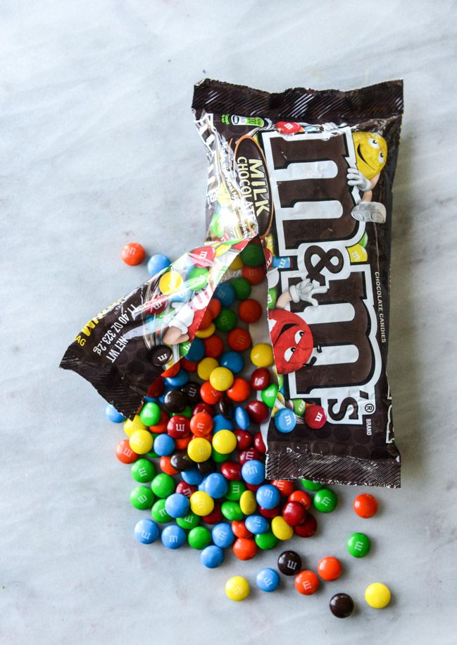 a bag of m & m's and some candy