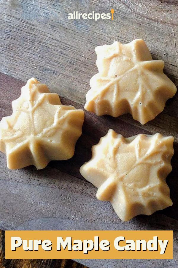 three pieces of maple candy sitting on top of a wooden cutting board with text overlay that reads pure maple candy