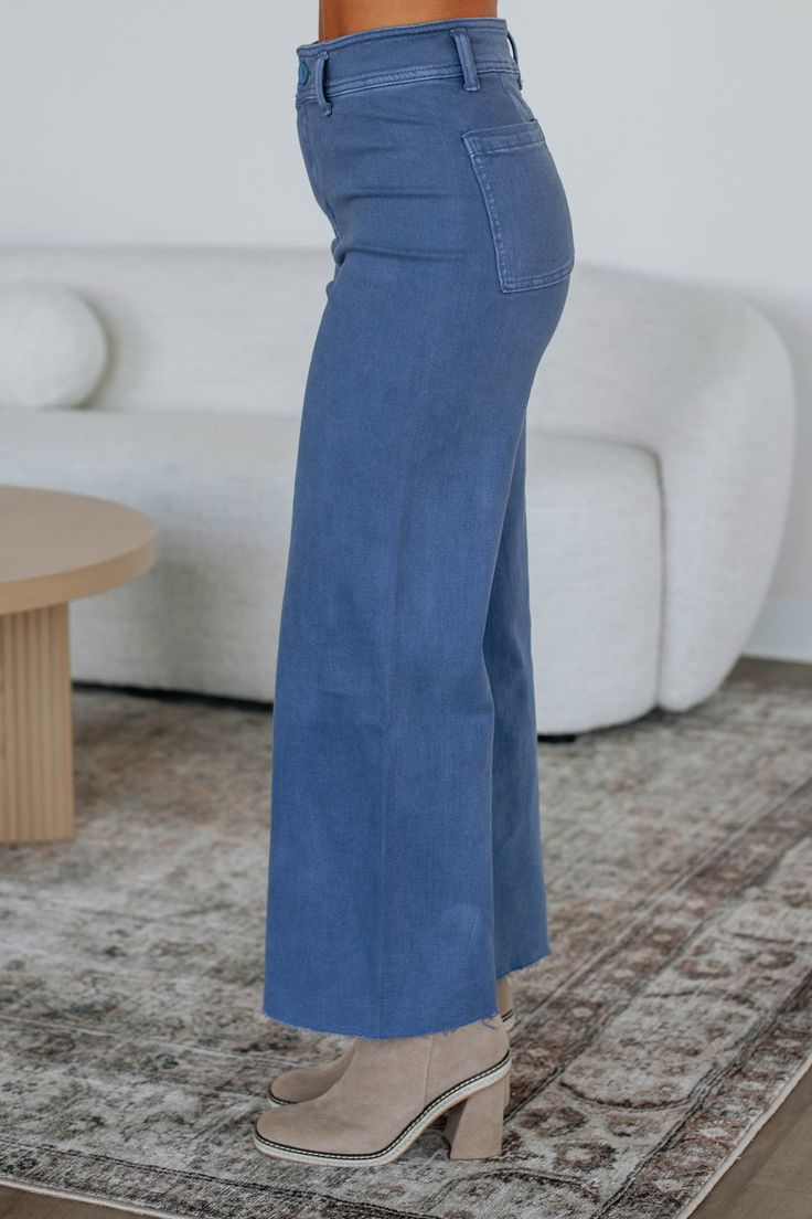 Details: Linsley Wide Leg Pants High Rise Zip Fly Button Closure Wide Leg Denim Material Minimal Stretch Raw Edge Frayed Hems Available in Multiple Colors Rise: 12" Inseam: 28" Material: 98% Cotton and 2% Spandex We are recommending: Small - Sizes (24-25) Medium - Sizes (26-27) Large - Sizes (28-29) Athleisure Shorts, Denim Material, Wide Leg Denim, Slate Blue, Cardigan Jacket, Raw Edge, Jeans Dress, Skirt Pants, Short Pants