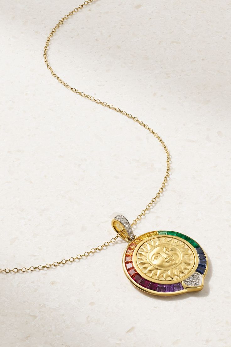 Inspired by the mantra "the sun always returns", Marina B's 'Soleil' collection is a bright spot in your jewelry drawer. This 'Rainbow' necklace is handmade from 18-karat gold and strung with a medallion centered by a version of the solar symbol that depicts a face. It's outlined in multicolored gemstones including sapphires, emeralds and rubies and has a diamond-encrusted bail. Luxury Yellow Gold Sun And Moon Jewelry, Luxury Yellow Gold Jewelry With Sun And Moon Design, Gold Coin Jewelry, Jewelry Drawer, Gender Fluid, Pendant Sets, Diamond Pendant Sets, Jewelry Set Design, Purple Quartz