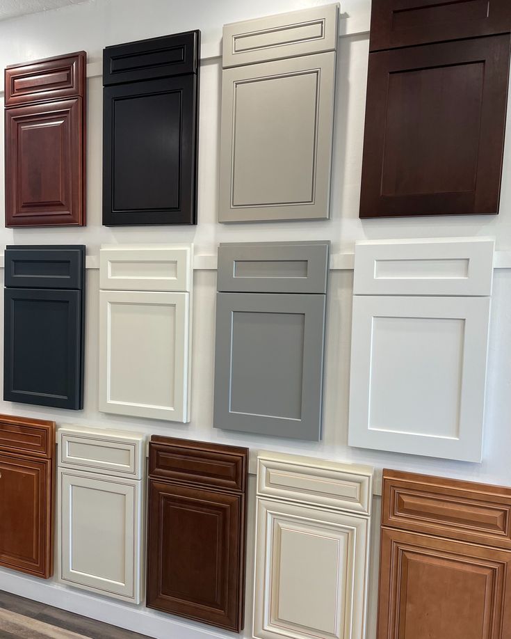 several different colors of cabinet doors and drawers on display in a store or showroom