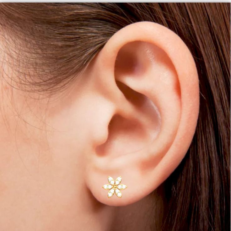 Diamond encrusted flower earrings crafted in solid 14k yellow gold. Diamonds thought to provide the wearer with better relationships and an increase in inner strength. Wearing diamonds is purported to bring other benefits such as balance, clarity and abundance. Genuine Diamonds: .2 carats Qty: 24 x 1.3mm Round H|I All of our products are available in 925 Sterling Silver, Solid 10k/14k/18k Yellow/White/Rose gold. We also offer other(unlisted) gemstones and custom stone combinations like center st Wedding Flower Earrings In 14k Yellow Gold, 14k Yellow Gold Flower Earrings For Anniversary, 14k Yellow Gold Flower Earrings Fine Jewelry, Classic Gold Diamond Flower-shaped Earrings, 14k White Gold Flower-shaped Diamond Earrings, Fine Jewelry 14k Gold Diamond Earrings With Flower Shape, 14k Gold Diamond Earrings With Flower Shape, 14k Gold Diamond Earrings In Flower Shape, 14k Gold Flower Shaped Diamond Earrings