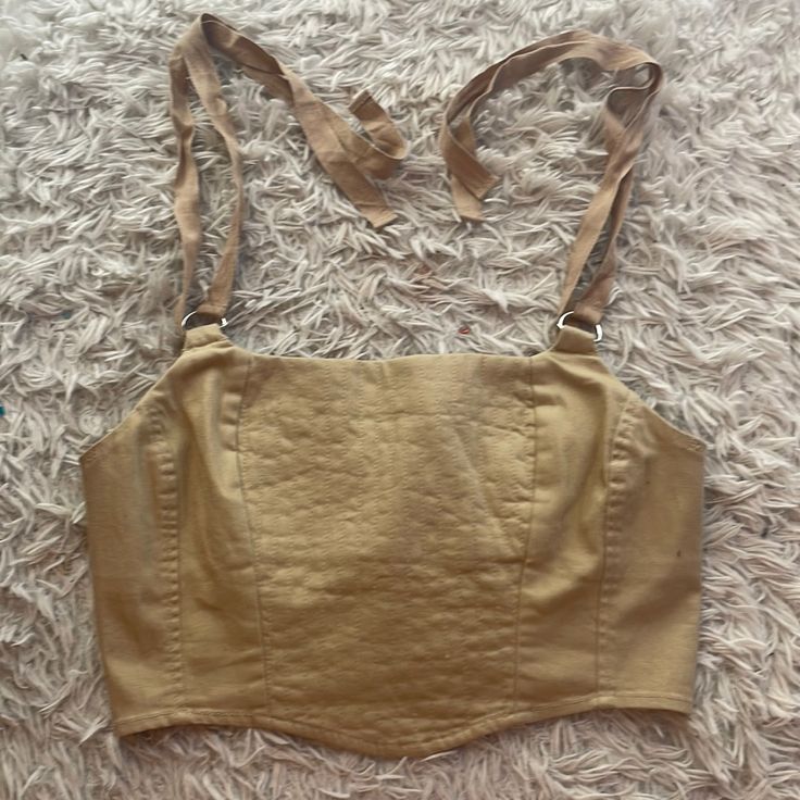 Biege Tie Back Tie On Top Bustier/ Corset Forever 21 Never Worn New Without Tags Spring Beige Corset With Built-in Bra, Beige Corset With Built-in Bra For Spring, Chic Beige Cami Crop Top, Spring Adjustable Straps Crop Top Corset, Spring Crop Top Corset With Adjustable Straps, Beige Fitted Cami Crop Top, Fitted Beige Cami Crop Top, Summer Beige Corset With Built-in Bra, Beige Corset With Built-in Bra For Summer