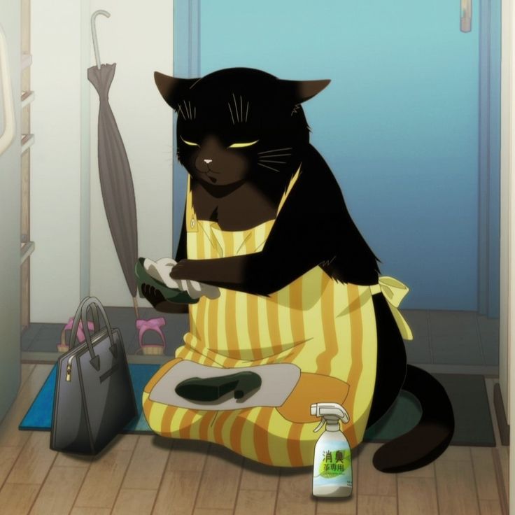 a black cat sitting on the floor with an umbrella