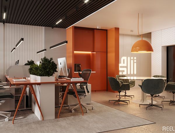 an office with two desks and chairs in it