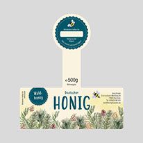 the front and back of a package for hong with pine branches on it, in white