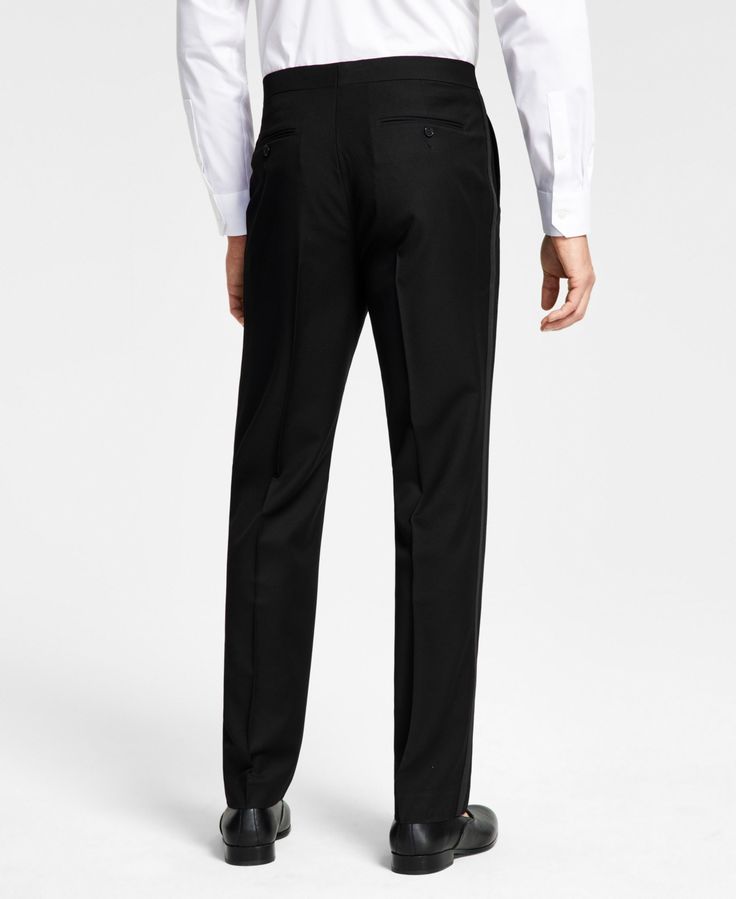 Make sure your style shines at your next sophisticated soiree with the crisp classic lines and shimmering grosgrain taping at the sides of these comfortable stretch suit pants from Alfani. Black Slim Fit Full Length Bottoms, Tailored Black Long Pants, Classic Black Straight Leg Pants, Slim Fit Black Pants With Tapered Leg, Business Black Slim Fit Bottoms, Black Slim Fit Bottoms For Business, Slim Fit Black Bottoms For Business, Formal Black Straight Bottoms, Black Tailored Full-length Bottoms