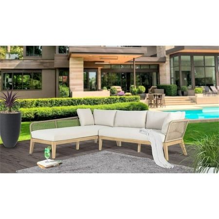 a white couch sitting on top of a wooden floor next to a swimming pool