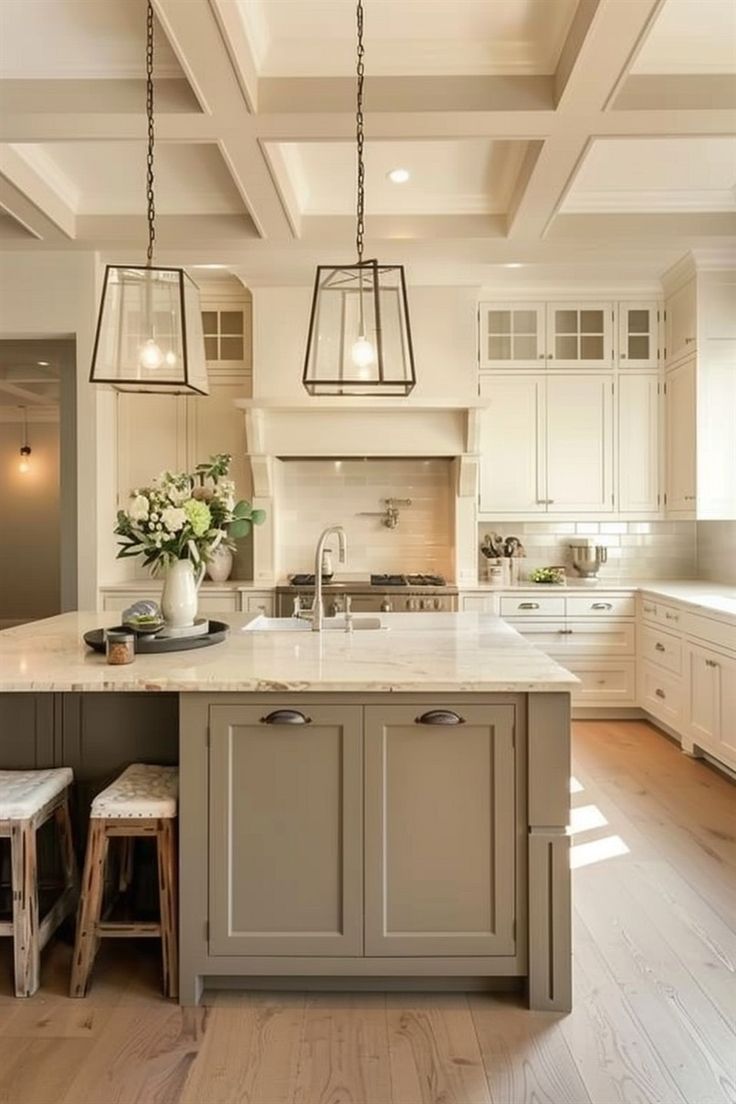 a kitchen with an island and two stools