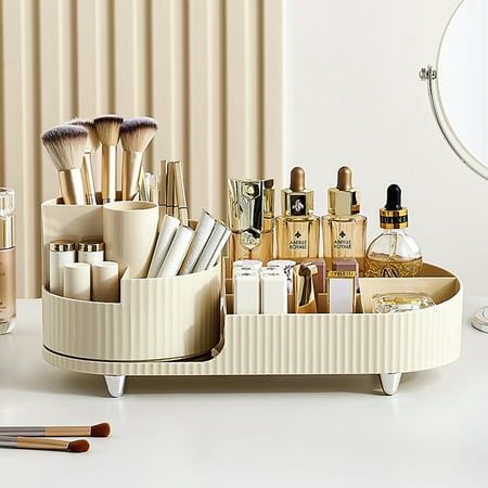 A makeup organizer is the simple solution to your problem and is ideal for streamlining your beauty routine and decluttering your home in one easy step. Not only is this cosmetic organizer practical, but it comes in gorgeous design and size to suit a range of different makeup spaces and needs. This adorable set comes with a larger compartment for storing full-sized bottles and a rotating brush holder to keep your brushes in place. Each compartment can hold a different category. The circular rota Makeup Organizer Countertop, Rotating Makeup Organizer, Rangement Makeup, Make Up Storage, Makeup Display, Perfume Organization, Úložný Box, Makeup Storage Box, Makeup Holder