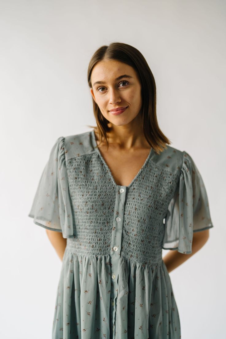 Add a touch of whimsy to your wardrobe with The Pineda Smocked Detail Midi Dress in Sage. This midi dress features a unique smocked detail that adds texture and interest, while the sage color adds a soft and playful touch. Perfect for any occasion, this dress is both stylish and fun! Details self/lining: 100% polyester Fabric Care Guide Here Sizing & Fit Measurements are approximate and taken while laying flat across the front. Not doubled. x-small: bust = 16"; length = 35" small: bust = 17"; le Henley Tee, Sage Color, Pattern Sweater, Cardigan Jacket, Small Bust, Light Weight Sweater, Stripe Sweater, Sweater Vest, Fabric Care