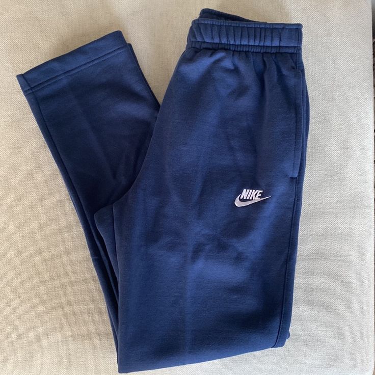 Reposhing This Item I Purchased From @Auntsherii. Nike Straight Leg Navy Sweatpants New With Tags Size S Supersoft And Plush Feeling Material! Inseam 29 Waist 13.5” Inner Drawstring Embroidered White Nike Logo Back Snap Pocket And Two Front Hand Pockets Please Bundle For Best Deals! See My Love Notes And Buy With Confidence! Thanks For Checking Out My Closet! Questions? Leave A Comment Below! Navy Blue Clothes, Navy Sweatpants, Straight Sweatpants, Champion Clothing, Straight Leg Sweatpants, Sweatpants Nike, Sweatpants And Hoodie, Nike Set, Pants Nike