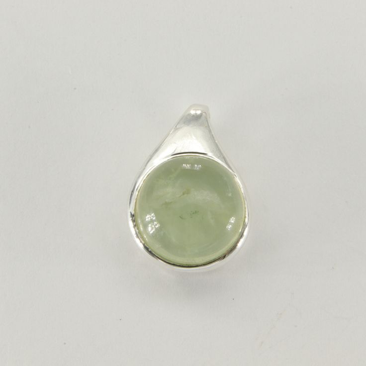 This is a beautiful Prehnite Pendant in 925 Sterling Silver. The pendant is made out of Sterling Silver with no nickel so there should be no allergic reaction and nothing will turn green. The silver is not only silver plated or steel but solid 925 Sterling Silver. We usually ship the same day in a nice gift box and we offer returns. Please note: Our jewelry is photographed close up to show detail and may appear larger than they are. We are happy to help with any questions. Hypoallergenic Green Sterling Silver Jewelry, Green Teardrop Polished Jewelry, Green Sterling Silver Drop Jewelry, Green Drop Sterling Silver Jewelry, Green Sterling Silver Jewelry With Polished Finish, Green Sterling Silver Gemstones With Polished Finish, Green Polished Sterling Silver Gemstones, Green Sterling Silver Teardrop Pendant Jewelry, Nickel-free Silver Peridot Jewelry