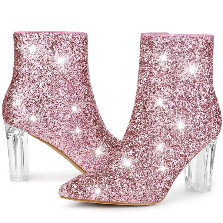 Hustle back to the disco era in this pointed-toe glitter boot lofted by a danceable heel. Sparkling gold and silver glitter give a celebratory vibe to this pretty ankle boot made with zip pull-tabs on the side. Glitter Ankle Boots; Clear Heels; Sparkle Glitter Boots; Pointy Toe; Chunky High Heel; Size Zipper. Vamp: Glitter; Outsole: Rubber; Heel: ABS; Heel Height: 3 1/3 inches; Shaft Height: 4 8/9 inches. Glitter Pointed Toe Party Boots, Party Glitter Boots With Pointed Toe, Glitter Boots With Pointed Toe For Party, Glamorous Ankle-high Party Boots, Glamorous Ankle-high Boots For Parties, High Heel Party Boots With Glitter Accents, Party Boots With Shimmer And Pointed Toe, Glamorous Glitter Boots With Round Toe, Glamorous Shimmer Boots With Pointed Toe