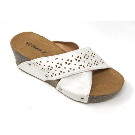 A pair of Victoria K Women's Laser Cut Out With Cross Over Strap Cork Wedge Sandals, offers a combination of comfort and style. The cork sole adds comfort. This trendy, sleek and chic look wears well anytime through out the day or a night. An elegant pair of?Victoria K ?Sandals adds flair to your everyday wardrobe. Size: Regular. Color: White. Gender: female. Age Group: adult. Comfortable White Platform Wedge Sandals, White Wedge Sandals With Arch Support, Comfortable White Open Toe Wedge Sandals, White Slip-on Wedge Sandals For Vacation, White Synthetic Comfortable Wedge Sandals, White Synthetic Wedge Sandals, Comfortable White Closed Toe Wedge Sandals, Comfortable White Synthetic Wedge Sandals, White Wedge Heel Sandals With Arch Support