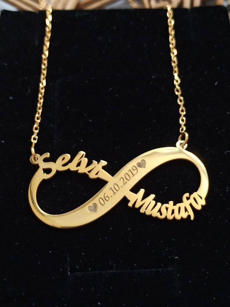 Color: on silver 14k gold plated Chain: .925 Silver Length: 40 cm 5 cm extension 45 cm Pendant size: 4 cm/1.8 cm Material: 925 Sterling Silver Weight:3.80 grams Infinity necklace, which is one of the jewelry products designed for couples, will become a symbol of your love and will be a concrete representation of your lifelong love. This necklace, which you can buy as a gift for the woman you love, will suit your neck with its yellow color. There is an option to print name and date. Stylish desig Infinity Shape Custom Name Necklace For Anniversary, Infinity Name Necklace For Anniversary Gift, Infinity Name Necklace For Anniversary, Custom Name Infinity Necklace For Anniversary Gift, Custom Name Infinity Necklace For Anniversary, Elegant Infinity Name Necklace For Anniversary, Silver Infinity Name Necklace For Anniversary, Personalized Silver Infinity Name Necklace, Personalized Sterling Silver Infinity Name Necklace