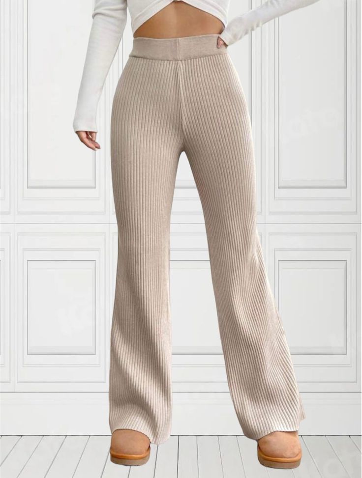 Turn heads in these stylish and comfortable tan ribbed knit flare pants. Made from a soft and stretchy fabric, these pants are perfect for any occasion. The high-waisted design flatters your figure, while the flared legs create a flattering silhouette. Dress them up with a blouse and heels for a night out, or dress them down with a t-shirt and sneakers for a day on the go. Features: High-waisted design Flare legs Ribbed knit fabric Stretchy and comfortable Available in a variety of sizes and col Ribbed Flare Pants, Knit Flare Pants, Flare Lounge Pants, Wide Leg Leggings, Silhouette Dress, 2024 Outfits, Tan Skirt, Flared Leggings, Future Outfit