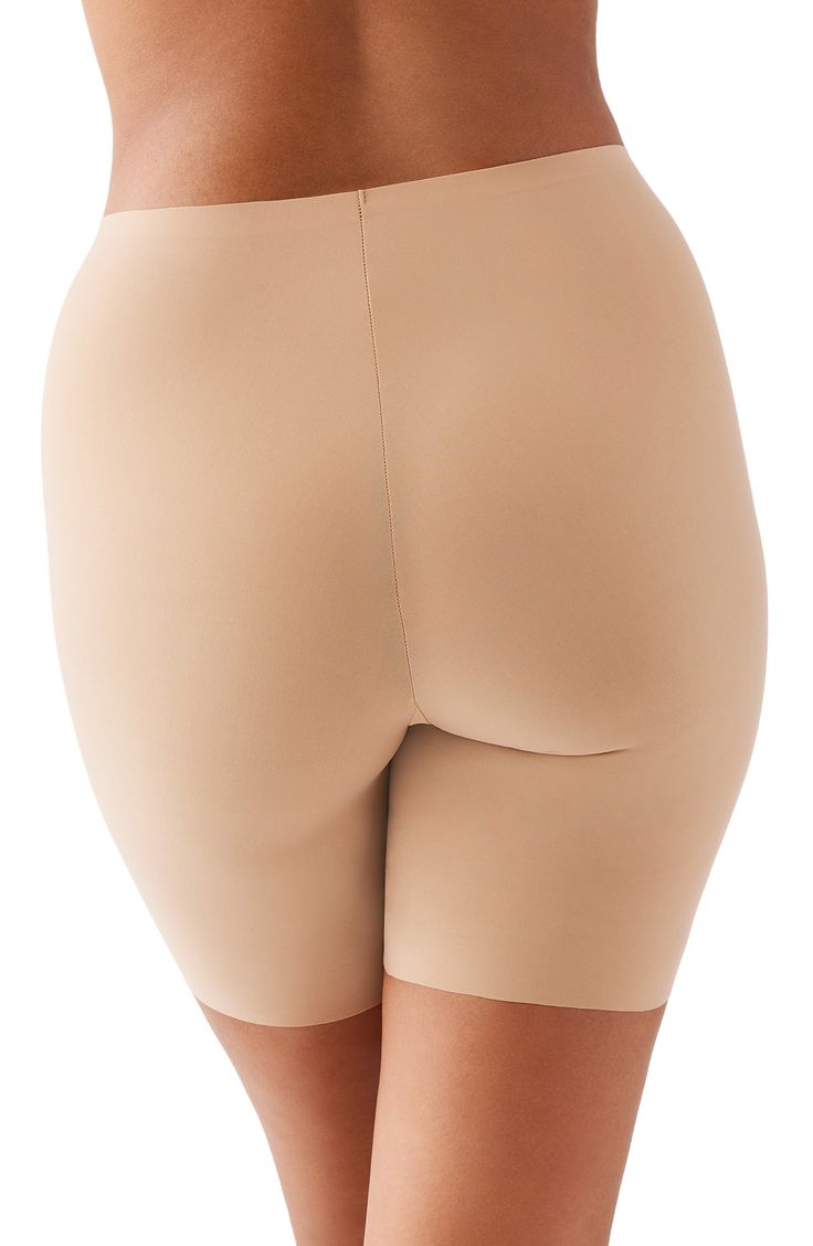 Get a sleek silhouette under outfits in these lightweight, superstretchy shaping shorts that offer allover, medium-level control and a line-free finish. 60% elastane, 40% polyamide Hand wash, dry flat Imported Compression Shapewear With Built-in Shorts, Shapewear Bottoms With Built-in Shorts, Fitted Smoothing Mid-thigh Shorts, Fitted Shapewear With Built-in Shorts, Compressive Smoothing Mid-thigh Bottoms, Compression Shapewear Bottoms, Short Length, Compressive Bottoms With Built-in Bra Mid-thigh Length, Compressive Shapewear With Built-in Shorts, Stretch Shapewear Bottoms