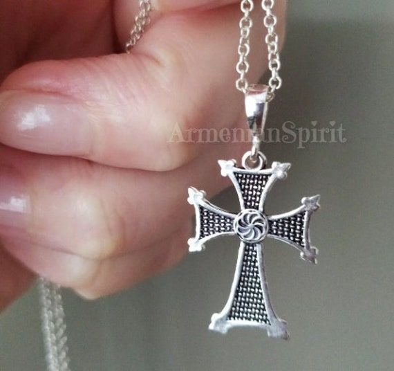 Christian cross made of sterling silver 925 with Armenian symbols of arevakhach or kerkhach which looks like a sun. The cross has a deep meaning for Armenians. Armenians were the first in the world to recognize Christianity as a state religion. Despite the fact that the cross carries Armenian symbols and meanings, it will suit all men and women who are interested in ancient symbols. The pendant cross really looks very stylish. The fact that it is made of precious metal gives it a special value a Spiritual Cross Necklace As Gift, Traditional Silver Cross Necklace, Traditional Silver Cross Necklace As Gift, Traditional Silver Cross Necklace Gift, Symbolic Cross Necklace As Gift, Symbolic Cross Necklace Gift, Silver Ankh Cross Necklace In Spiritual Style, Silver Ankh Cross Necklace Spiritual Style, Silver Ankh Cross Spiritual Necklace