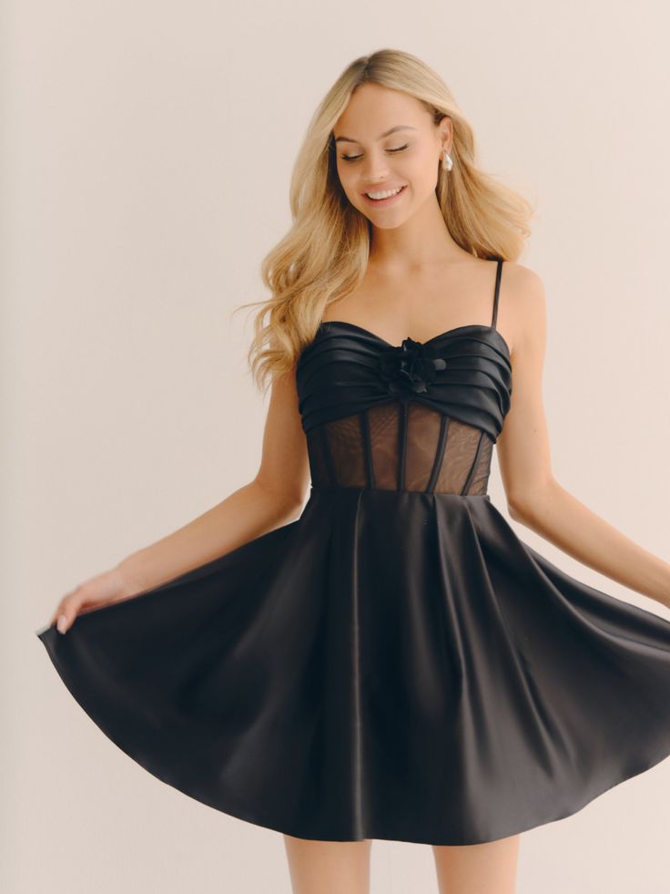 This chic A-line dress features a captivating sheer mesh bodice with a sweetheart neckline and structured boning, perfectly blending elegance and allure. The satin skirt adds a touch of sophistication, making it ideal for homecoming, date nights, or special occasions. With adjustable spaghetti straps and a flattering fit-and-flare silhouette, this dress ensures you stand out in any crowd. PRODUCT DETAILS: Material: Satin Lining: Fully Lined Closure: Hidden Back Zipper Details: Sweetheart Neckline, Fit and Flare, Strapless, Short Elegant A-line Corset Dress For Homecoming, Homecoming Evening Dress With Illusion Neckline And Fitted Bodice, Party Dress With Boned Bodice And Spaghetti Straps, Fit And Flare Party Dress With Corset Back, Party Dress With Corset Back And Fit And Flare, Evening Fit And Flare Corset Dress With Sweetheart Neckline, Satin Mini Dress With Boned Bodice For Prom, Spaghetti Strap Mini Dress With Boned Bodice For Prom, Party Fit And Flare Dress With Corset Back