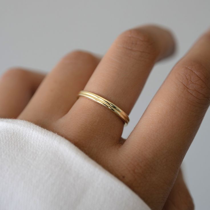 This is a sweet and simple ring that is perfect for a minimalist look, stacked with other rings, or as a simple wedding band. Made of 925 Sterling Silver Available in 14k Gold or Rhodium Plating We use a THICK 14k Gold plating - for a piece that will last you years to come! VERY HIGH QUALITY Available in sizes 4-12 Ring Height: 2.4mm Ring Sizer Layering Diamond Necklaces, Simple Wedding Band, Double Band Ring, Simple Wedding Bands, Double Band Rings, Chunky Earrings, Simple Ring, Gold Band Ring, Ring Sizer