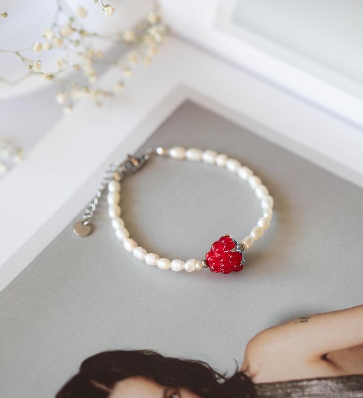 This bracelet will be a great addition to your look and a great gift for friends or even yourself!  All items come with a gift bag and are shipped using tracked postage. ∙ A P P R O X ∙ M E A S U R E M E N T S ∙ Length:  Please note: the length of the bracelet is 16.5cm with an adjustable length. If you would like a custom size, please leave a note in your order! ∙ M A T E R I A L S ∙  Strong durable steel cord, glass seed beads, metal beads, gold plated clasp and extension chain, lampwork bead, Gift Pearl Bracelet With Heart Beads, Gift Heart Bracelet With Colorful Round Beads, Heart Bracelet With Round Beads As Gift, Handmade Pearl Crystal Bracelet Gift, Adjustable Heart Beads Pearl Bracelet, Adjustable Pearl Bracelet With Heart Beads, Heart-shaped 8mm Bead Jewelry Gift, Handmade Pearl Crystal Bracelet As Gift, Handmade Pearl Crystal Bracelet For Gift