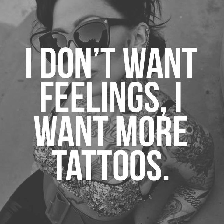 a woman wearing sunglasses with the words i don't want feelings i want more tattoos