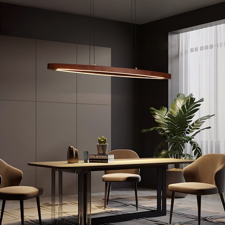 a dining room table with chairs and a potted plant