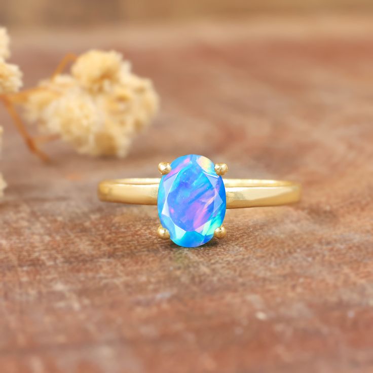 Blue fire Ethiopian opal ring for women, minimalist ring, October birthstone, AAA Ethiopian opal ring, 925 Sterling silver ring, Gold ring, gift for her. *Other Similar Jewelry Available Here* https://www.etsy.com/shop/AreebaJewelry Details:- Gemstone - Ethiopian opal  Stone Color - Natural  Stone Setting - Prong Quality - AAA Grade Rize Size - 4 US TO 9 US Available Type - 100% Natural  Shipping service - Free worldwide shipping service About AreebaJewelry:- AreebaJewelry takes great pride in t Minimalist Opal Rings With Gemstone, Blue Opal Promise Ring, Minimalist Opal Rings For Gifts, Minimalist Opal Rings For Gift, Minimalist Opal Ring As A Gift, Minimalist Opal Birthstone Promise Ring, Round Opal Solitaire Jewelry, Round Solitaire Opal Jewelry, Opal Birthstone Jewelry In Open Ring Shape