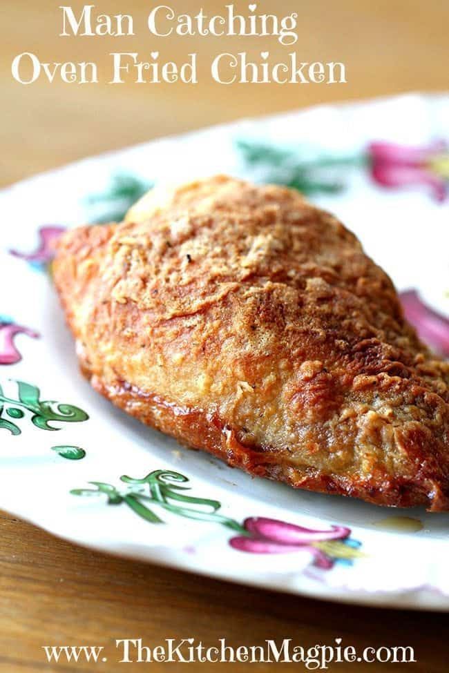 a piece of meat sitting on top of a white and blue flowered plate next to a fork