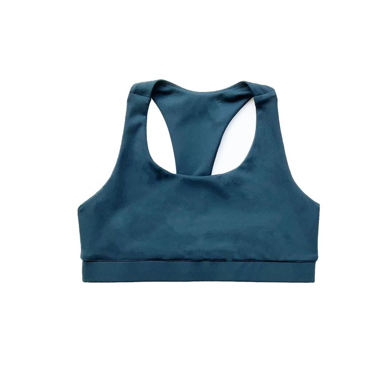 Reinventing the classic Racerback Sports Bra, a perfect blend of form and function, designed to complement our sleek leggings for a matching and stylish workout look.  The innovative sweat-wicking technology works tirelessly to keep you feeling fresh and focused, wicking away moisture with effortless efficiency. But it's the 4-way stretch fabric that truly sets this sports bra apart, offering a level of flexibility that moves in harmony with your body. Whether you're bending into a yoga pose, po Technical Squat Proof Activewear For Yoga, Blue Technical Activewear For Yoga, Technical Blue Activewear For Yoga, Go-dry Snug Fit Activewear For Training, Snug Fit Functional Yoga Activewear, Technical Fitted Sports Bra Sweat Resistant, Technical Snug Fit Activewear For Sports, Technical Fitted Sweat Resistant Sports Bra, Basic Athletic Fit Activewear For Workout