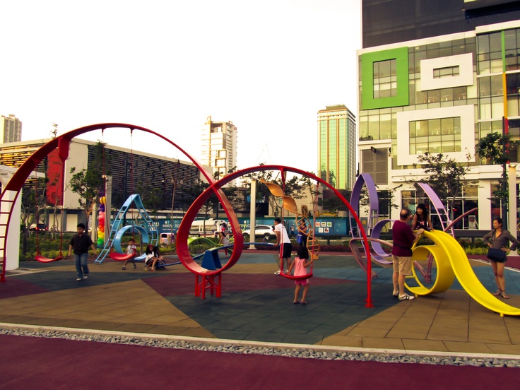 children playing in an outdoor playground area