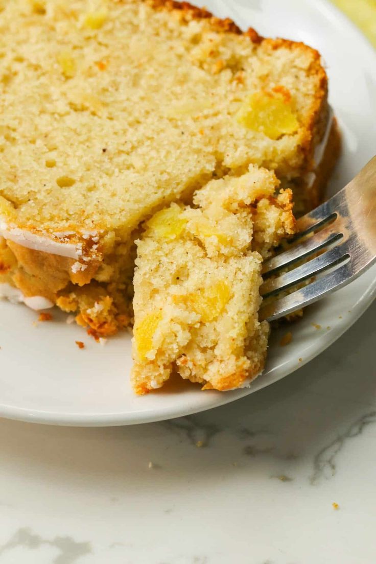 a piece of cake on a plate with a fork